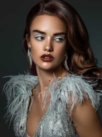Schaeffer Studios Beauty Photographer for Hola Magazine Featuring Angela Rado in Aqua Feather Dress