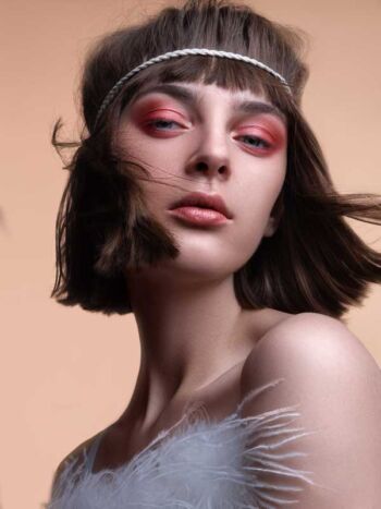 Schaeffer Studios NYC Beauty Photography Featuring Ann Kazannik For Elle Magazine Feather Top