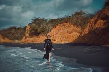 Schaeffer Studios NYC Fashion Photography Featuring Madison Anderson for InPuerto Rico Magazine Wearing De La Vali on Black Sand Beach